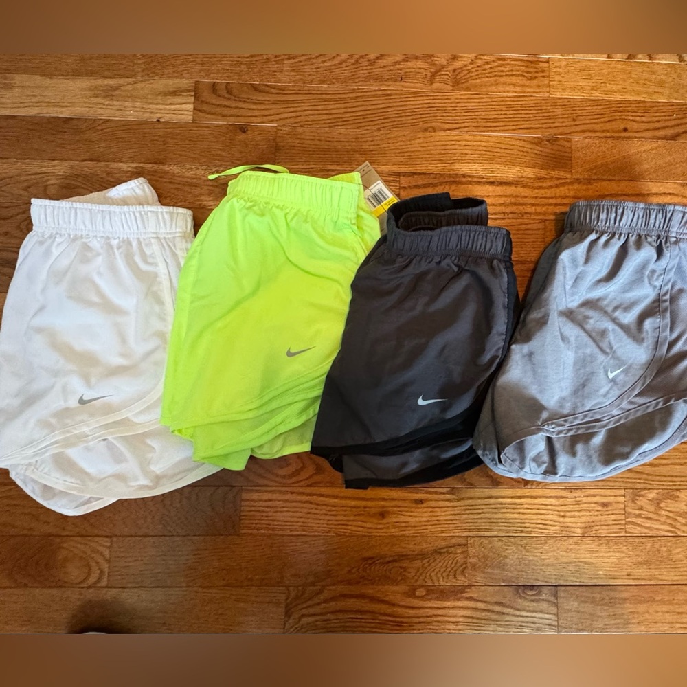 Nike women’s  dri-fit  shorts- set of 4 - Gray, Black, White, Neon Green small